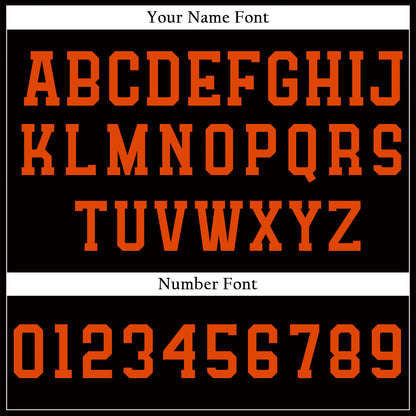 Custom black baseball jersey with orange lettering and piping
